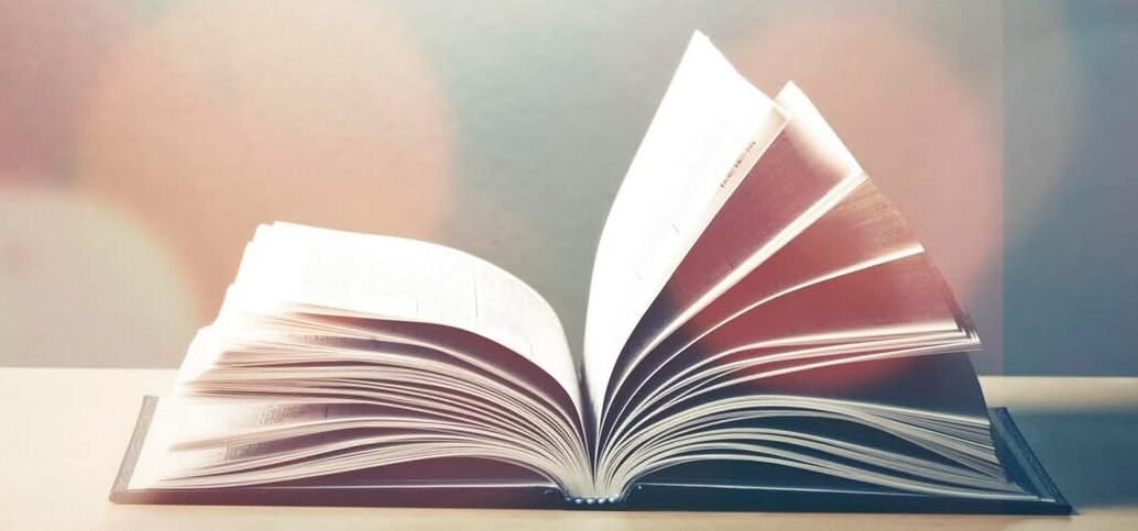Open book with light